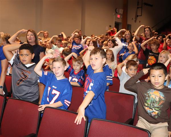 Students participating in assembly