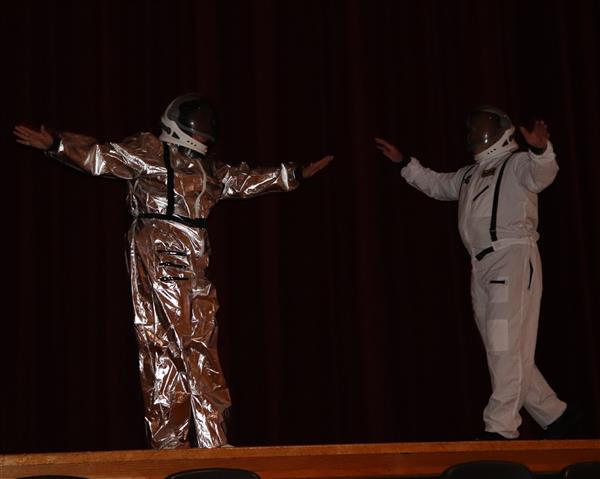 Principals in space suits
