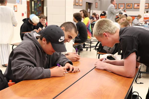 Students coloring their puzzle pieces