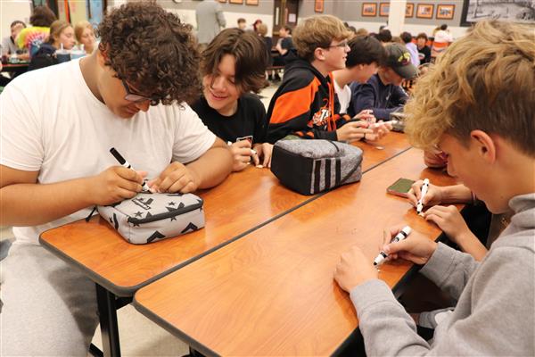 Students coloring their puzzle pieces