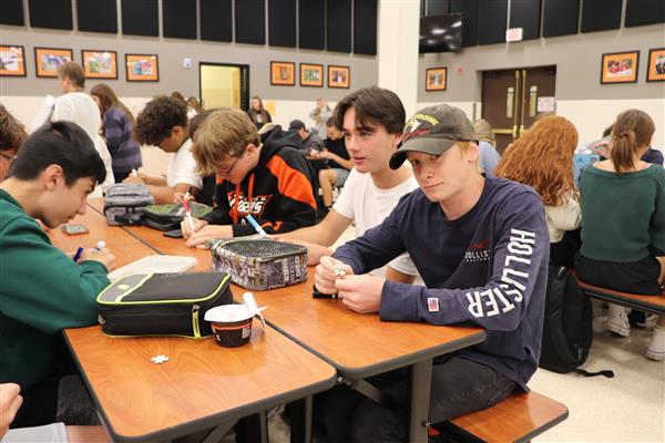 Students coloring their puzzle pieces