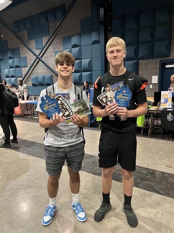 Seniors with college brochures