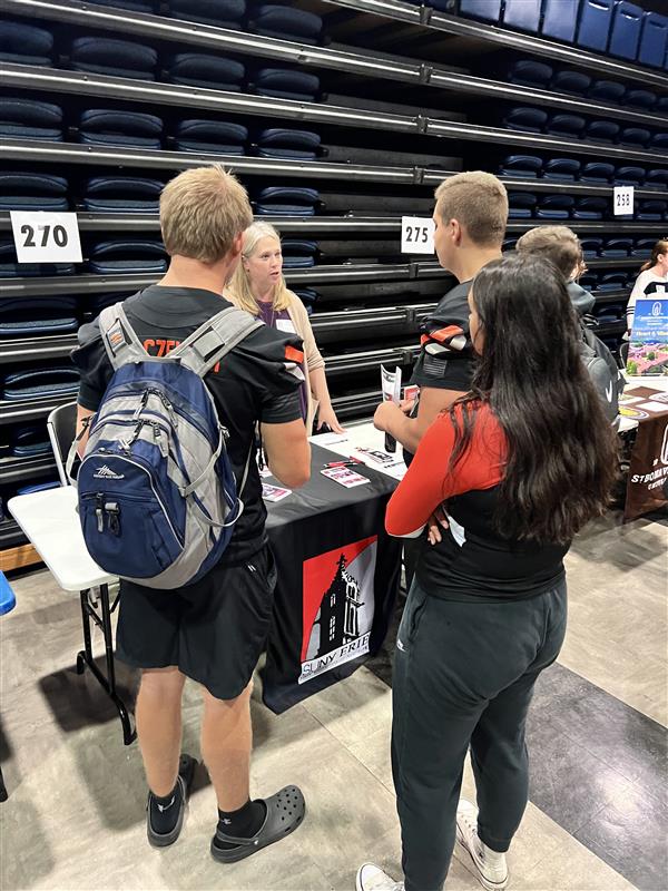 Students speaking with representative