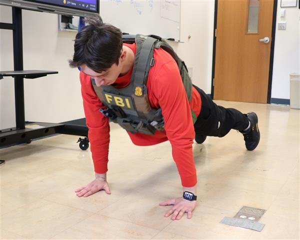 Jonas completing push up challenge