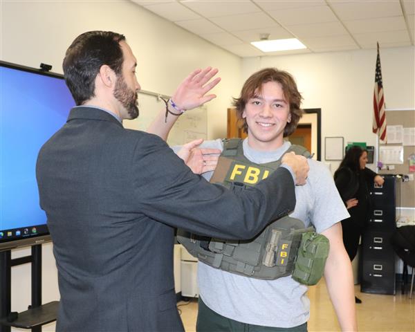 Canyon getting fitted with FBI utility vest