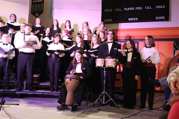 Varsity Chorale with percussionists