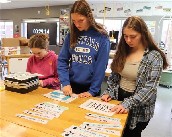 Students working clues