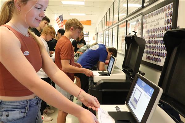 Cara submits her ballot