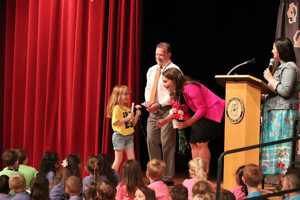 Principals giving certificate