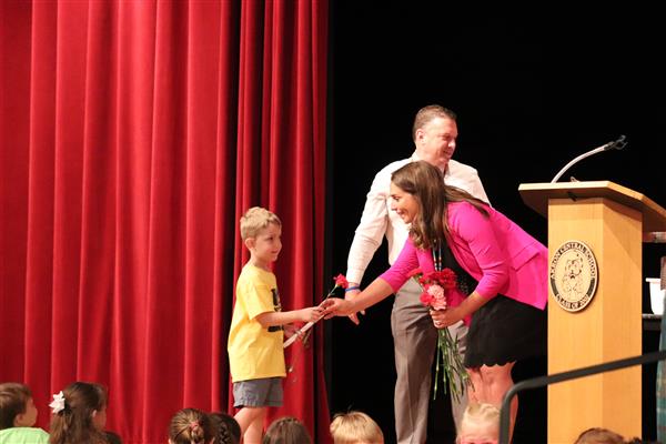 Principals giving certificate