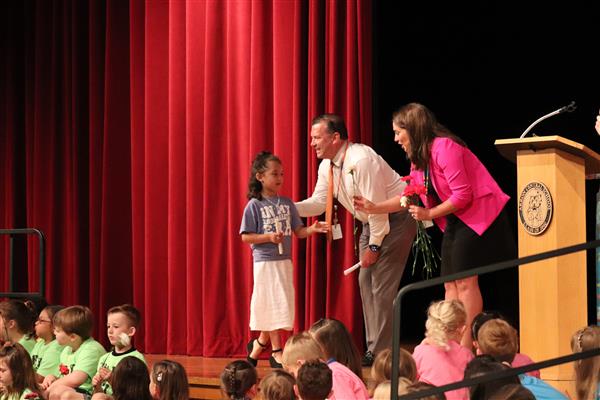 Principals giving certificate