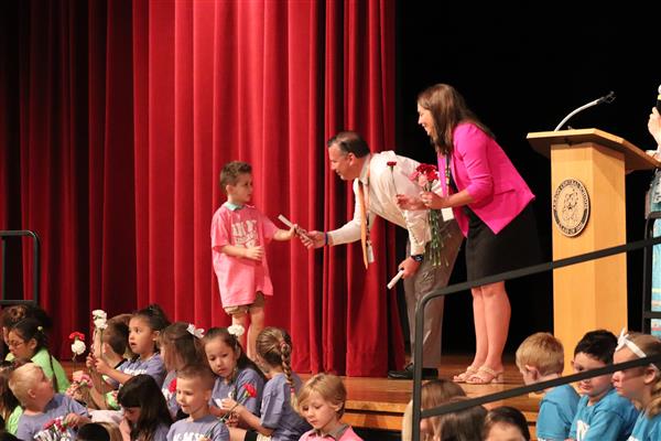 Principals giving certificate