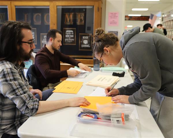 students receiving ballots
