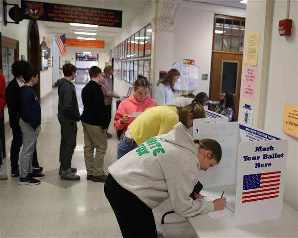 students completing ballot