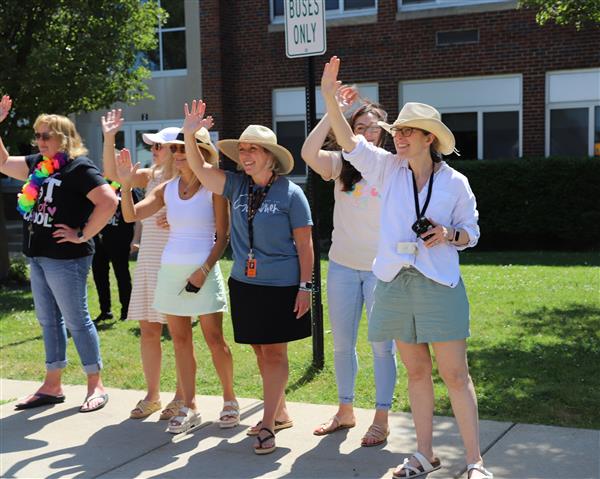 teachers waving