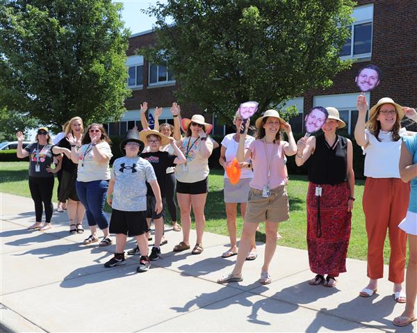 teachers waving